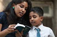 Boy and girl reading the scriptures