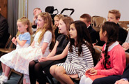Children singing in church