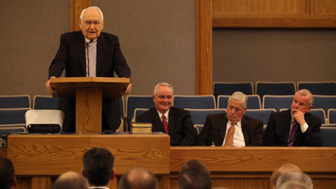 Elder Perry at the pulpit