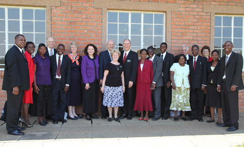Elder Nelson with local leaders in Malawi