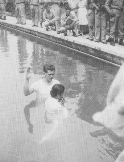 Boyd K. Packer preparing to perform a baptism in Japan after World War Two