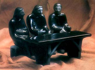 Christ sits at the center table