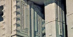 Detail of geometric carvings around the tops of the windows
