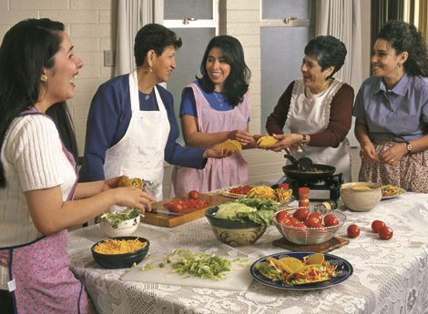 women preparing meal