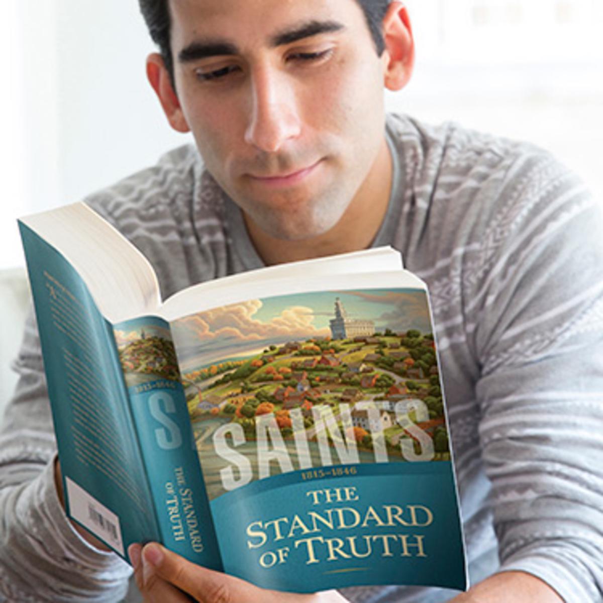 Man reading Saints
